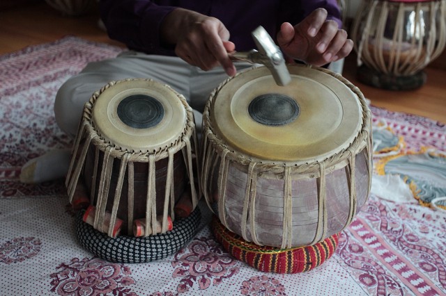 Playing the tabla.