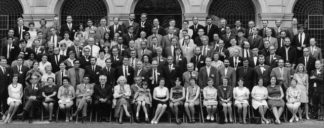 Conway met Elwyn Berlekamp and Richard Guy at this 1969 gathering at the University of Oxford. Conway is on the third row from the top, second from right (with a beard). Berlekamp is in the fourth row from the top, sixth from right (also with a beard). Guy is in the fourth row from the top, ninth from the left (in a striped tie). Among other mathematical luminaries in the photo, the peripatetic mathematician Paul Erdős is seated in the front row, with the young girl in his lap.