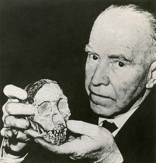 Raymond Dart with the Taung child.