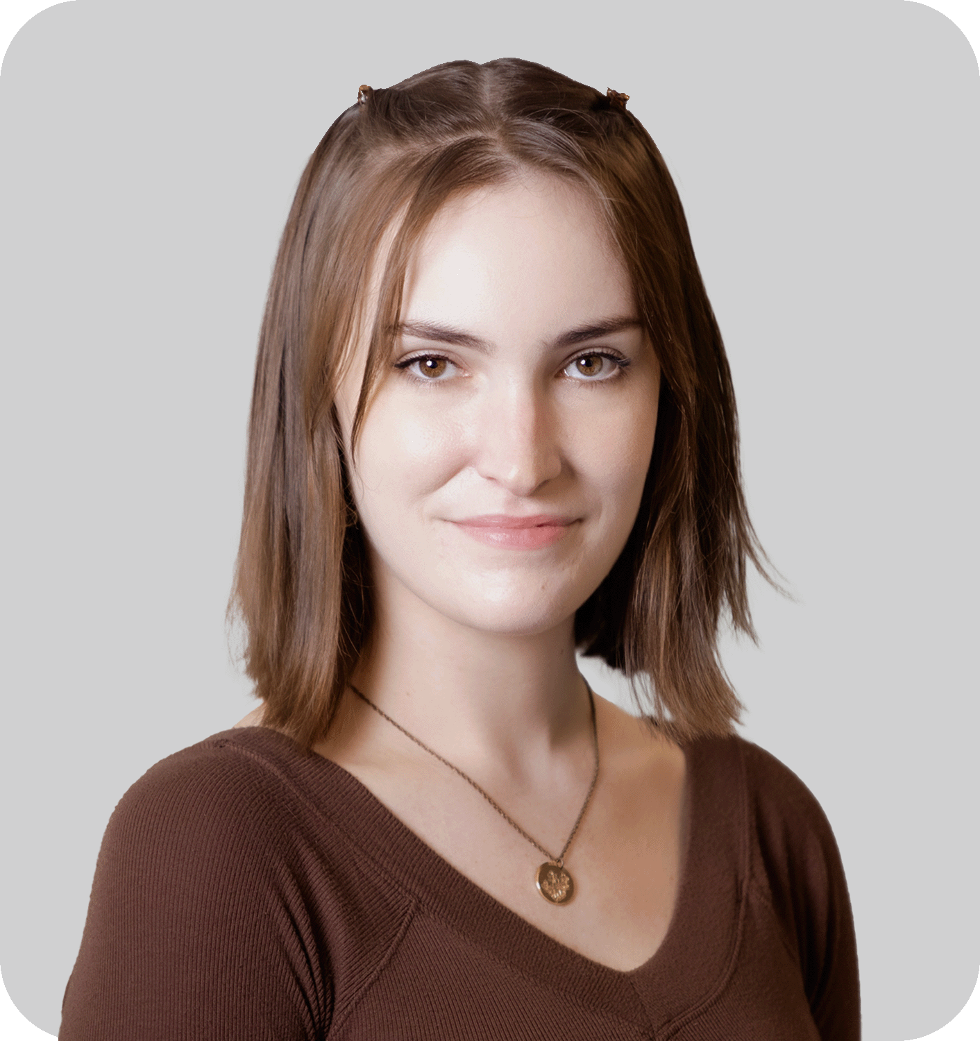 A smiling woman with brown hair