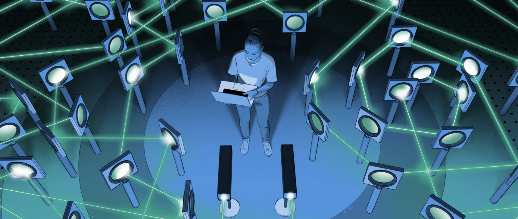 Illustration of a man holding a laptop while standing in the middle of a complicated optics experiment. Green laser beams fly around every which way.