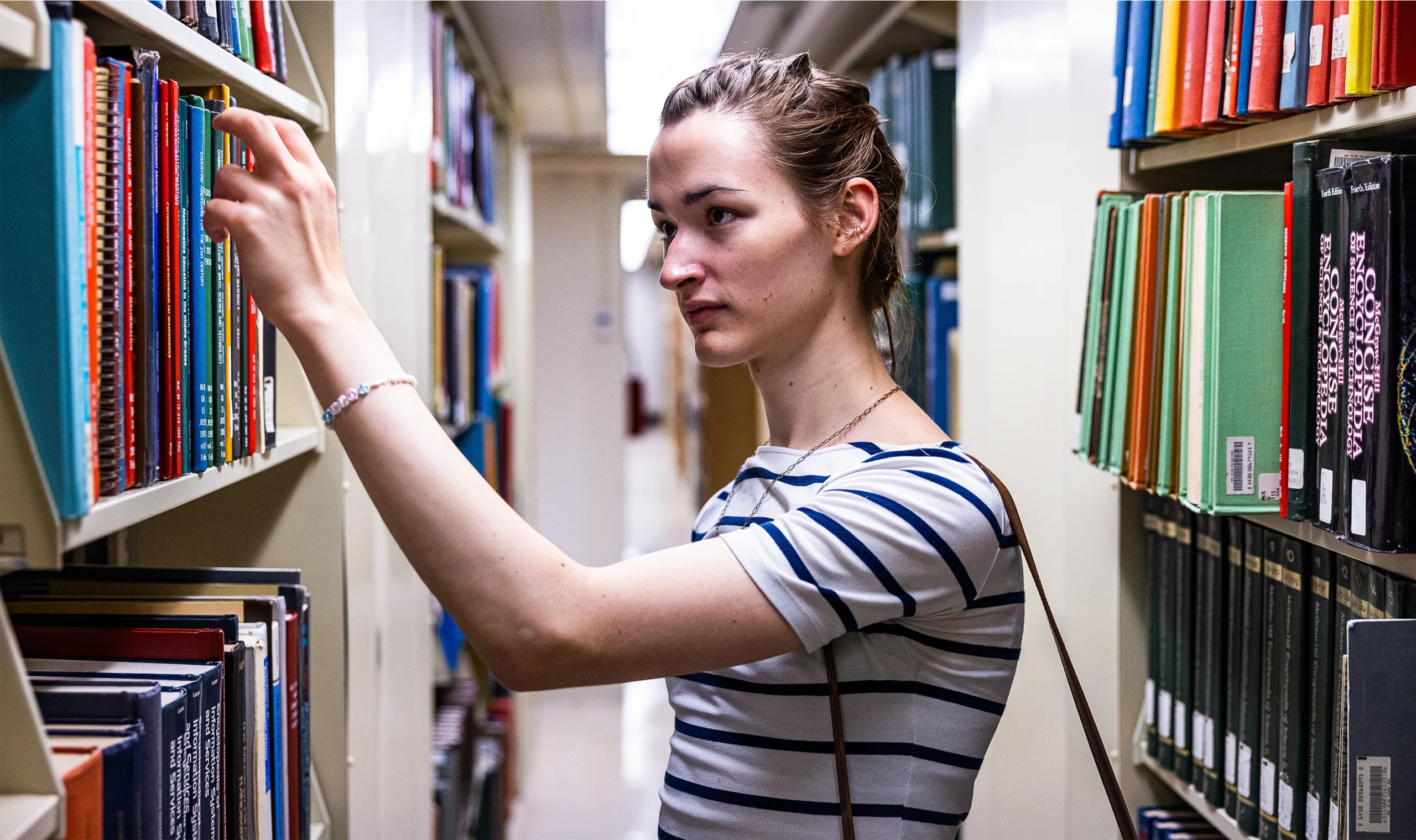 Woman in a library.