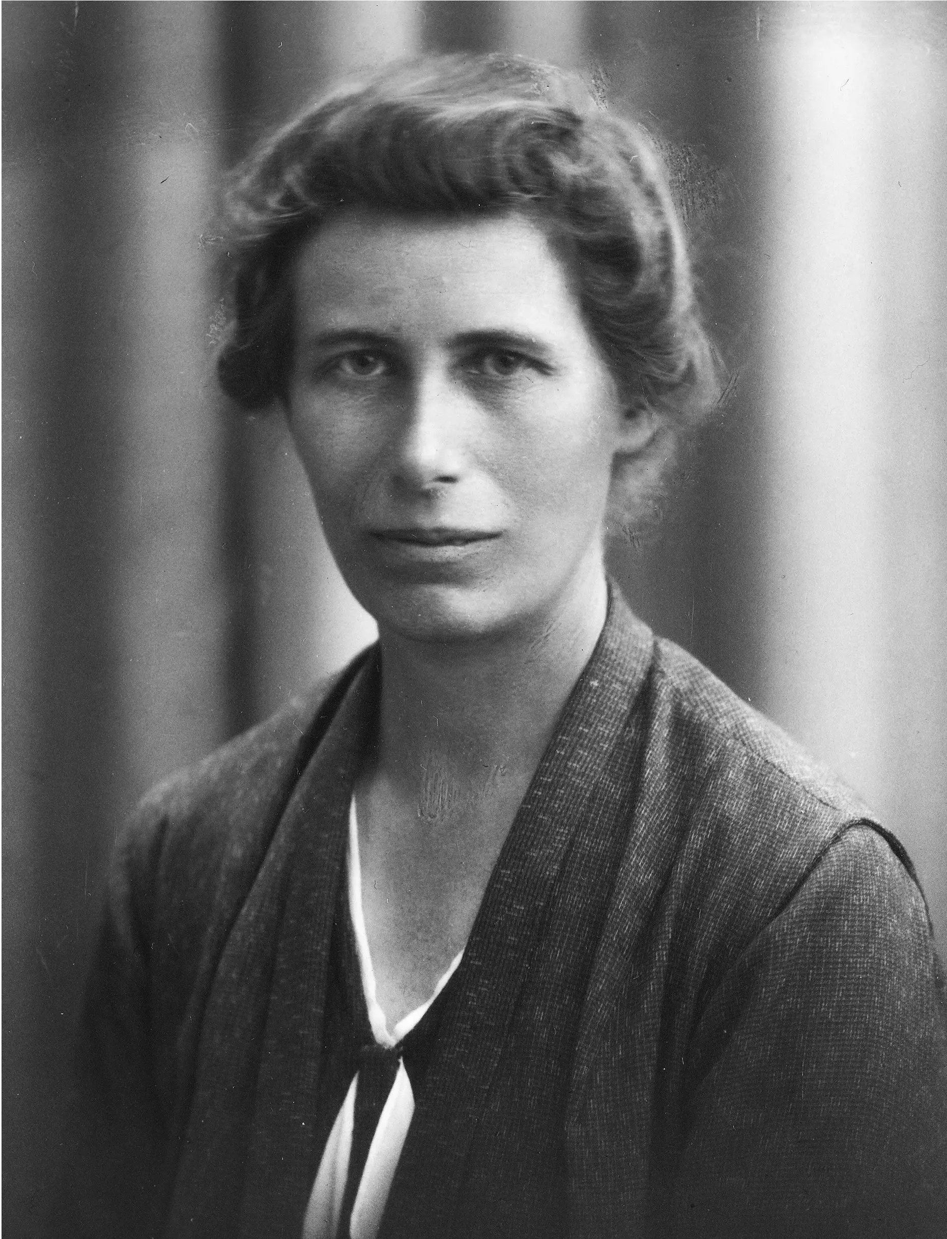 Black and white portrait of a woman.