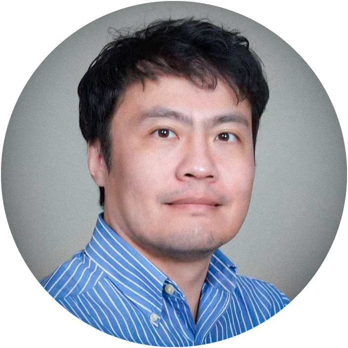 Man in blue-and-white striped shirt.