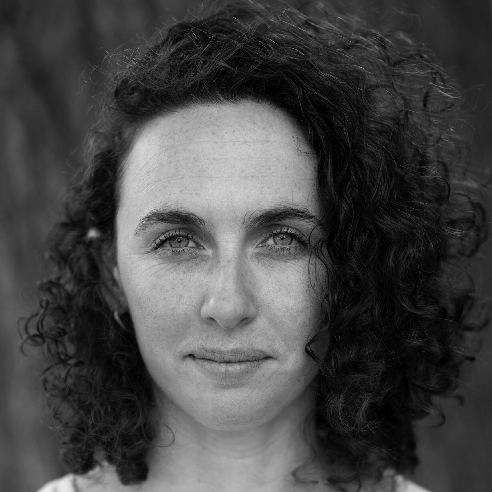 A woman with curly hair