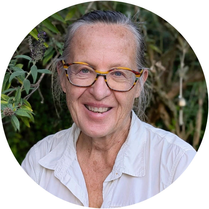 A smiling woman with glasses