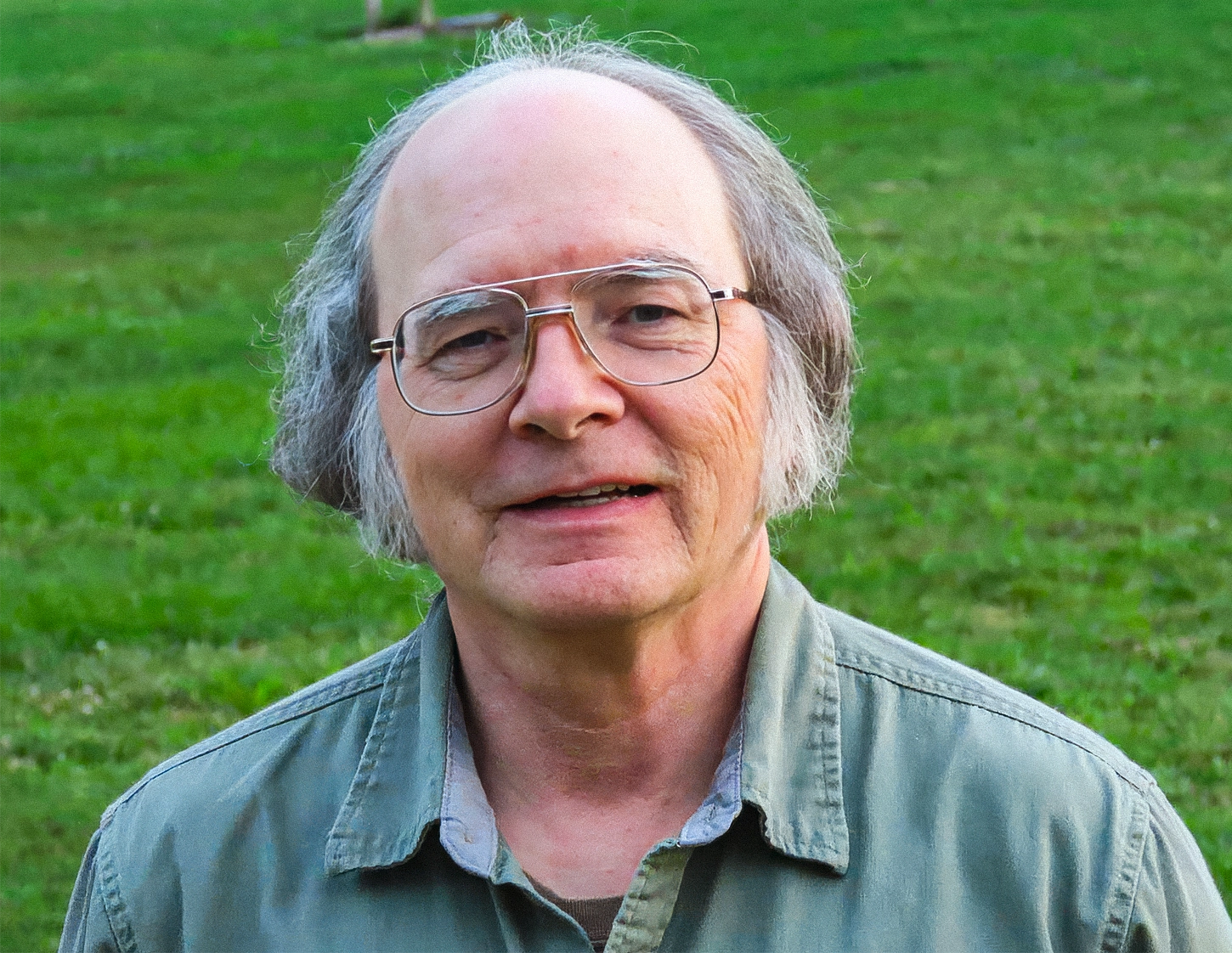 A white-haired man in glasses.
