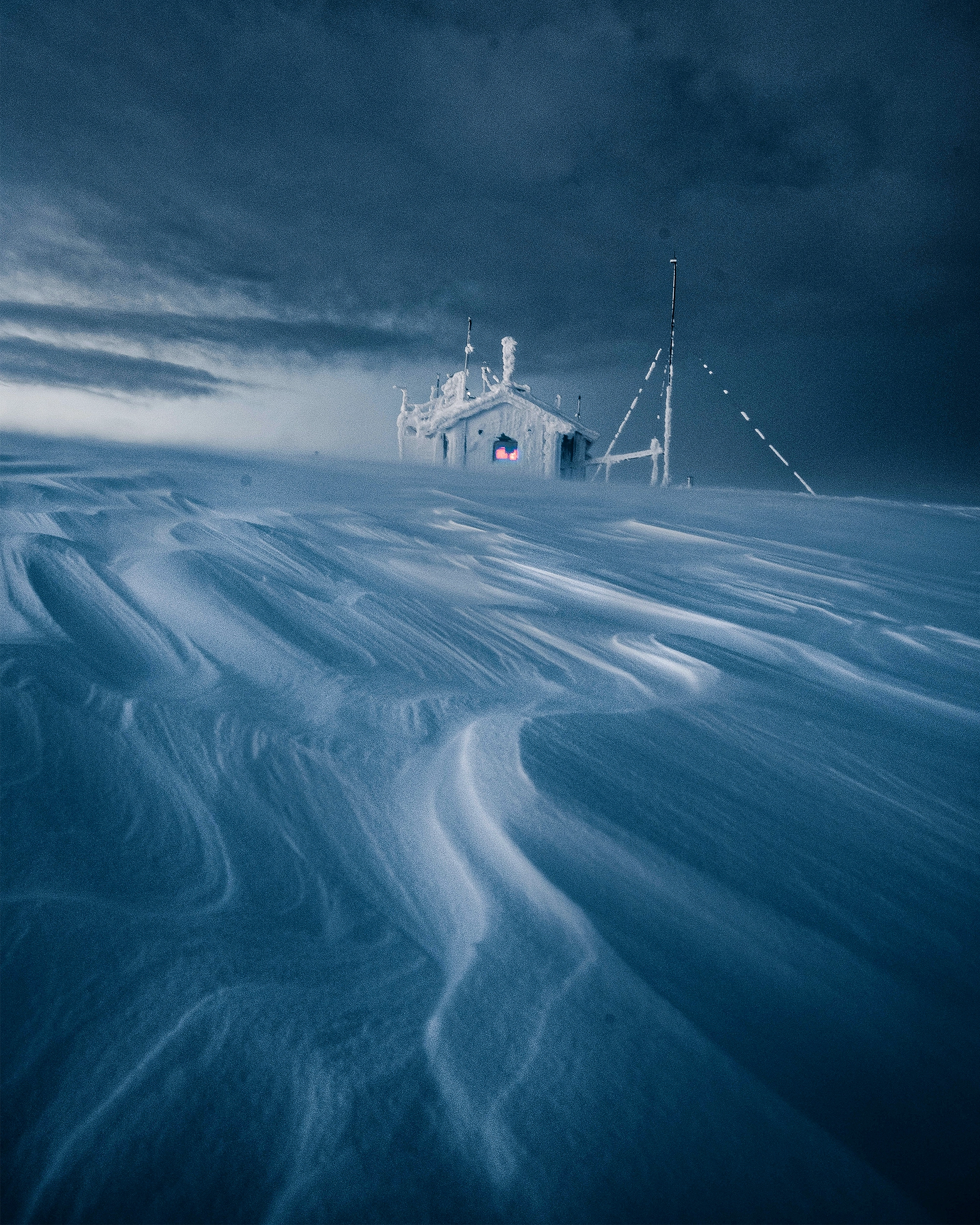 A measurement station sits in a remote tundra.