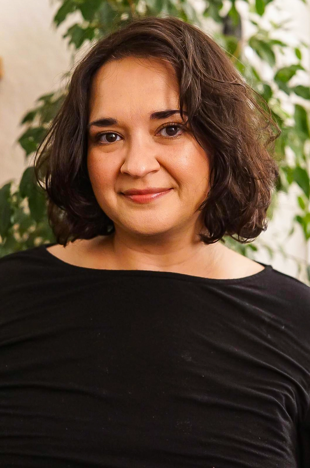 a woman in a black shirt.