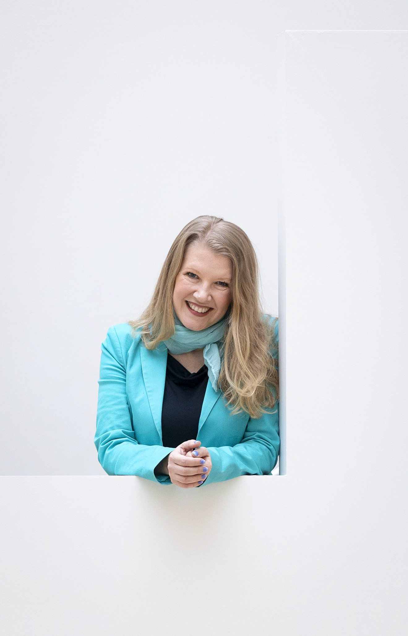 Fedorenko framed by white architecture.