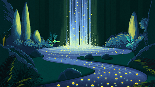 Golden spheres float in a waterfall.