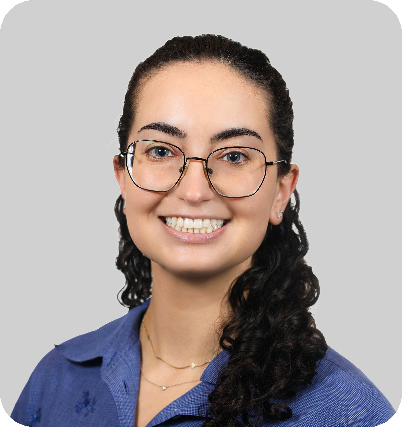 A smiling woman with glasses