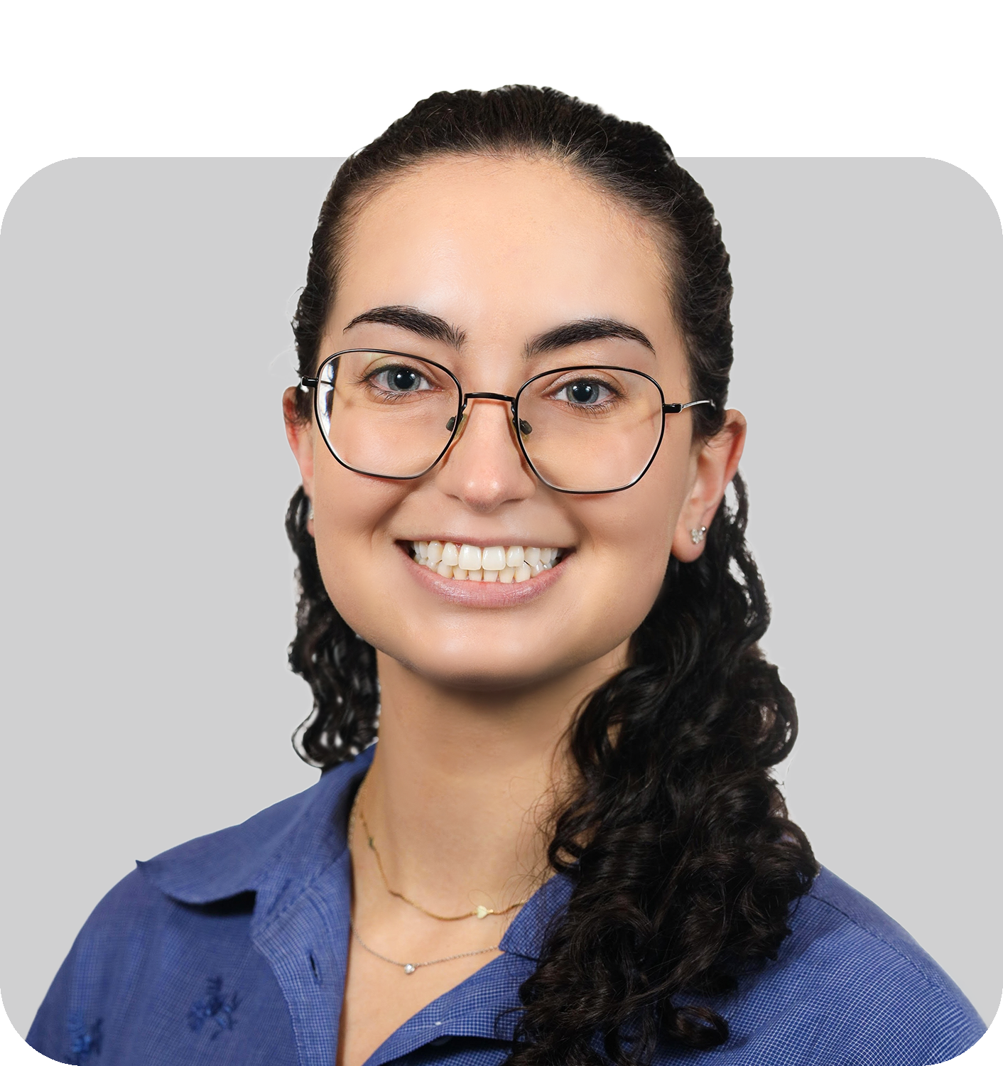 A smiling woman with glasses