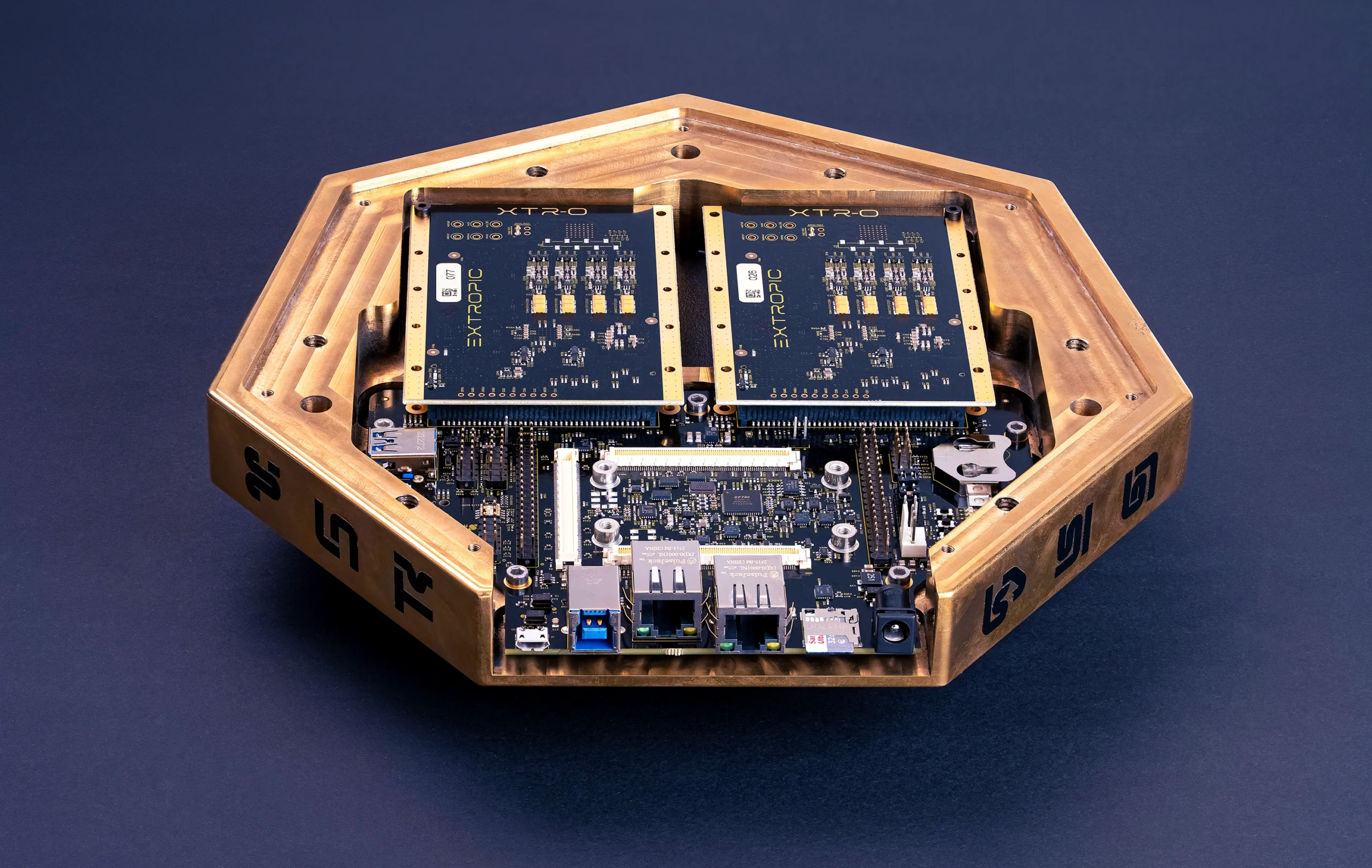 A seven-sided polygon housing holds computing components marked with the word EXTROPIC