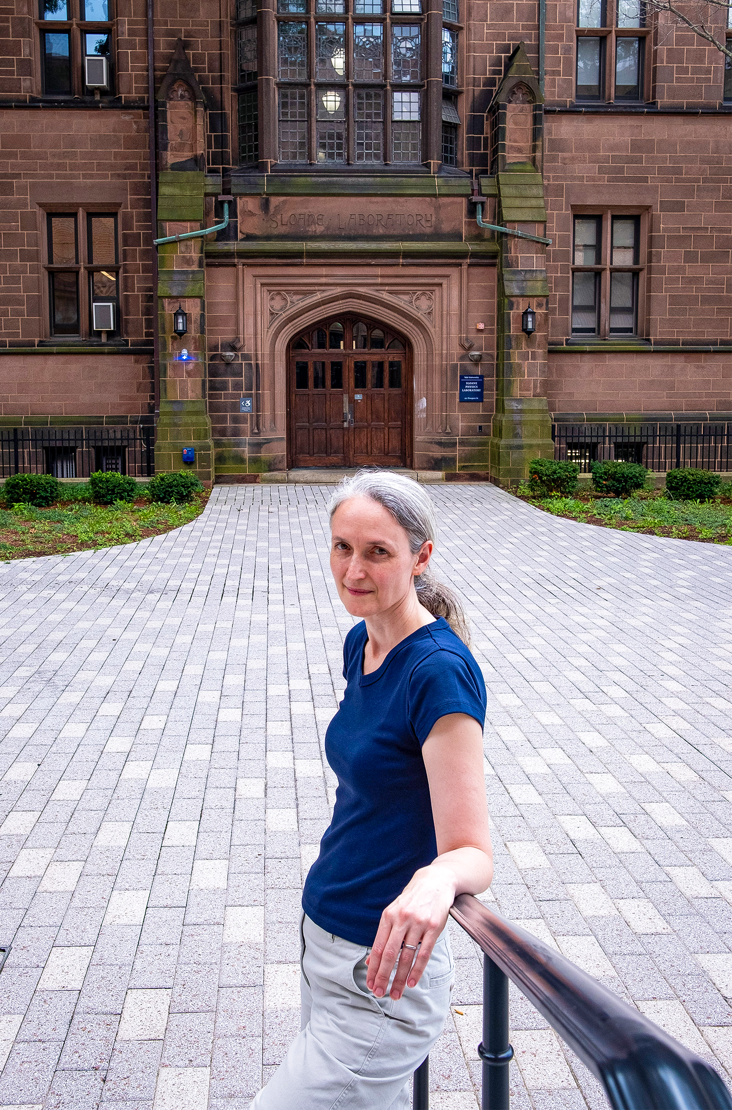 Demers poses outside on Yale University’s campus.